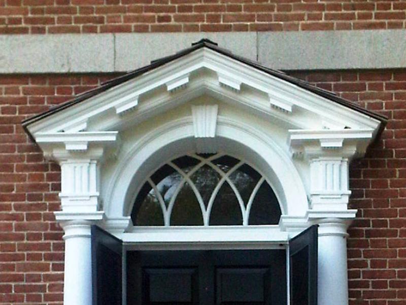 Georgian houses displayed a strict symmetry with a paneled door as a centerpiece capped by an elaborate crown or pediment.