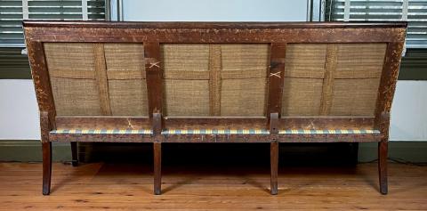 The sofa back showing original under-upholstery.