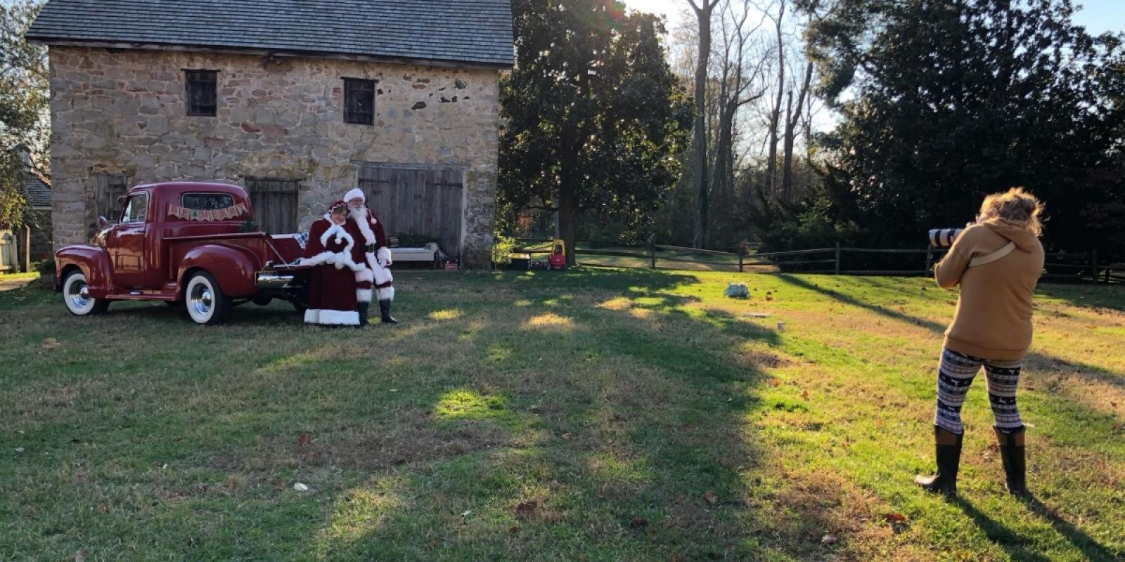 Santa & Mrs. Clause portrait on bed of truck